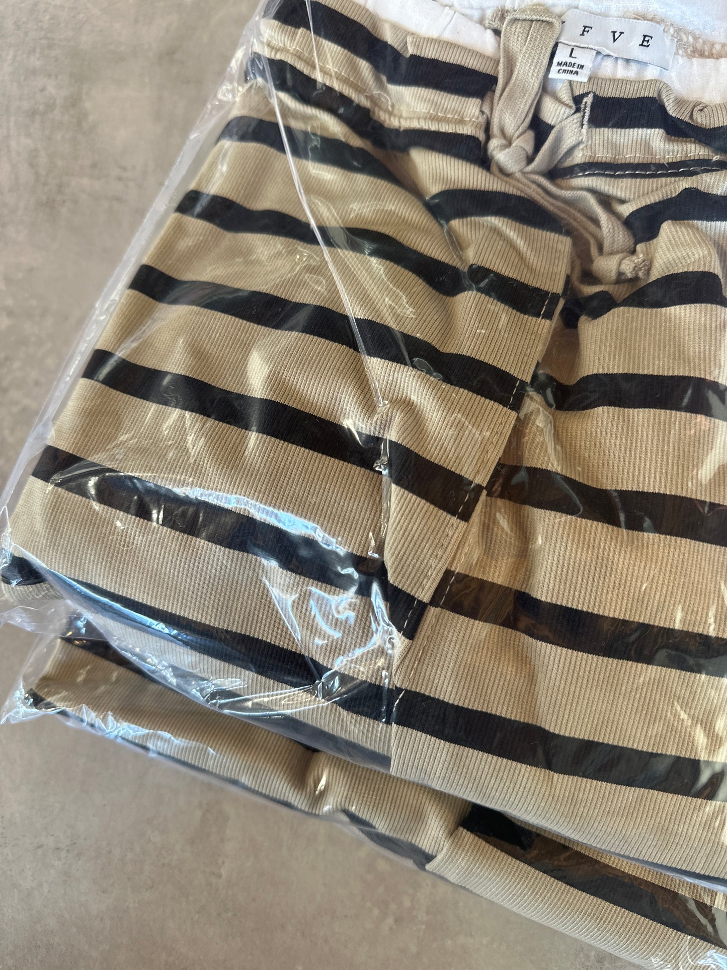black and olive stripe pants