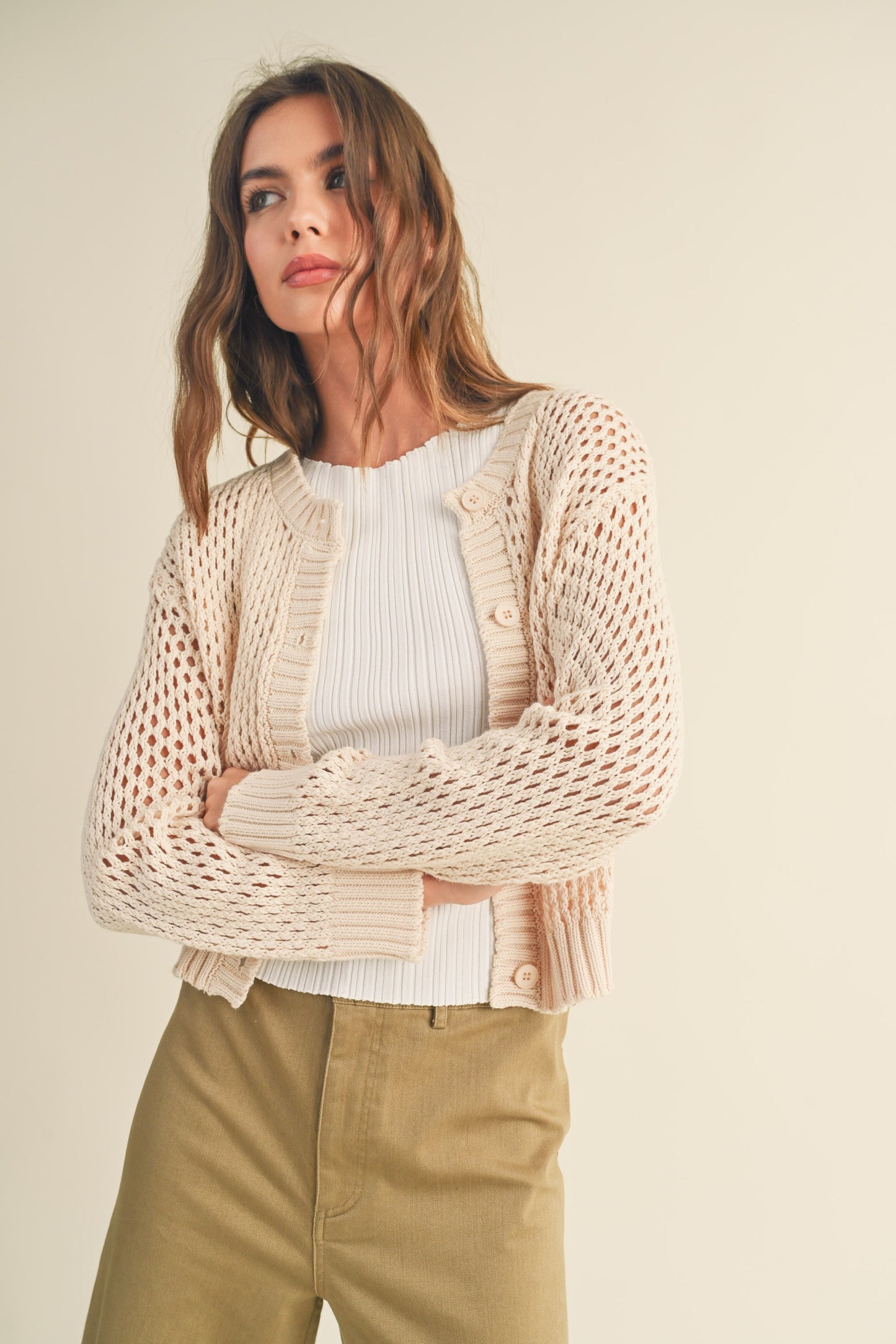beige knitted cardigan