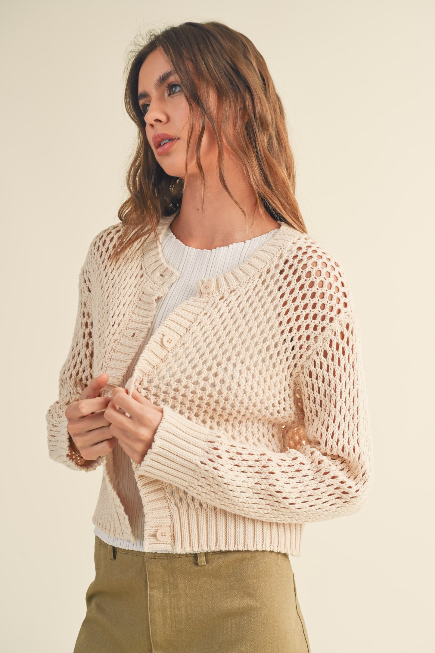 beige knitted cardigan