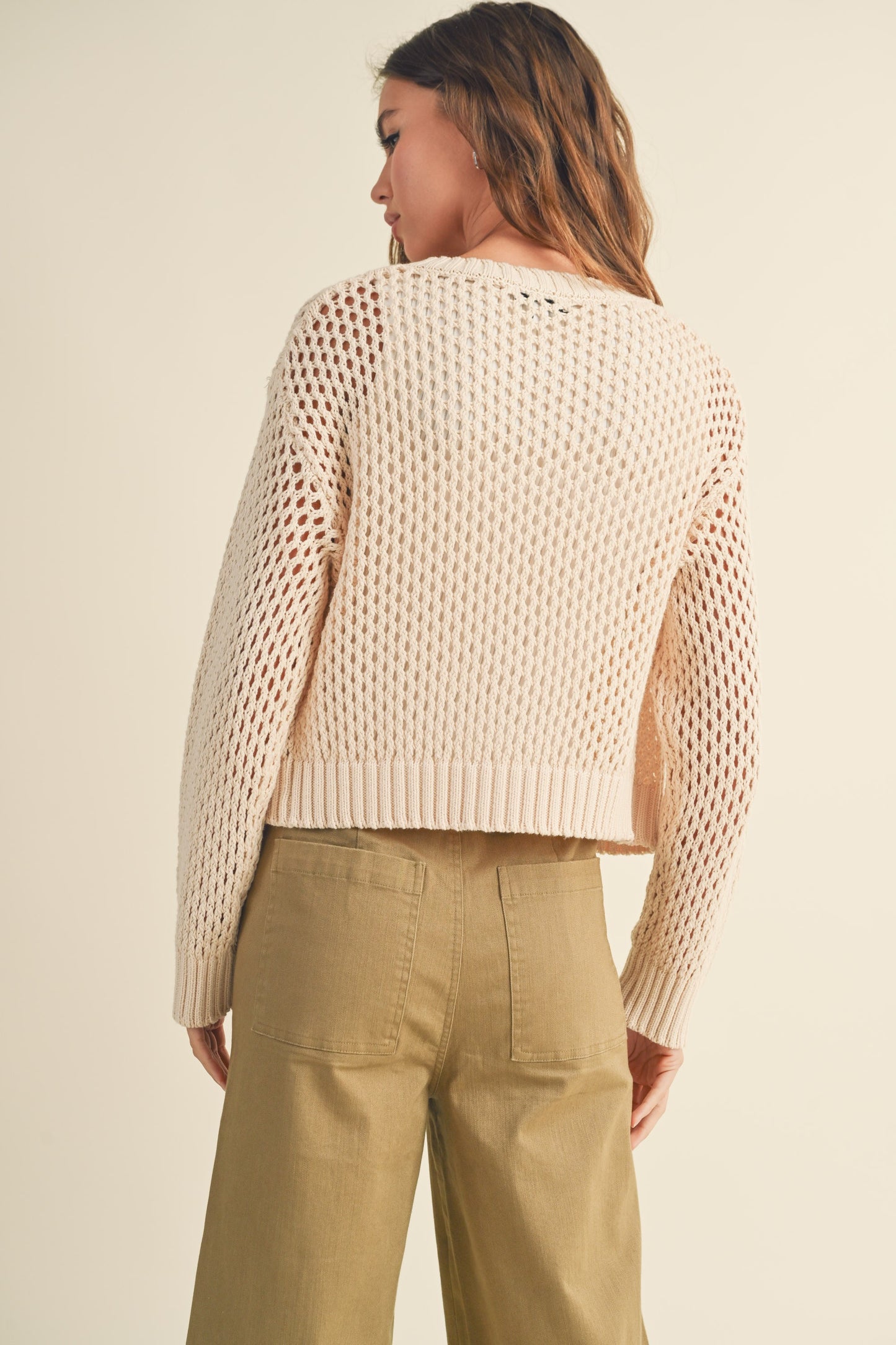 beige knitted cardigan